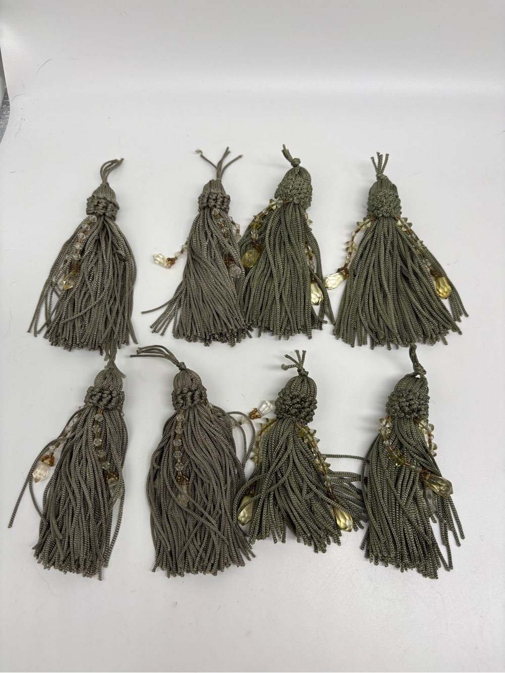 Set of 8 decorative tassels with beads for home decor crafting